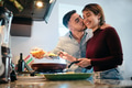 Young Couple Cooking Together And Kissing - PhotoDune Item for Sale