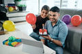 Couple Celebrating Birthday Party Doing Video Call With Tablet - PhotoDune Item for Sale