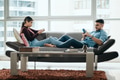 Young Couple Ignoring Each Other While Using Smartphone - PhotoDune Item for Sale