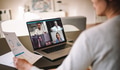 Woman discussing business with team over a video conference - PhotoDune Item for Sale