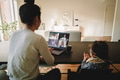Businesswoman having a video conference call from home - PhotoDune Item for Sale