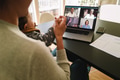 Woman at home video conferencing with colleagues - PhotoDune Item for Sale