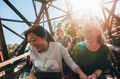 Young people on a thrilling roller coaster ride - PhotoDune Item for Sale