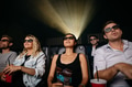 Young people watching 3d movie in theater - PhotoDune Item for Sale
