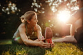 Beautiful young woman exercising at park with man - PhotoDune Item for Sale