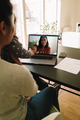 Mother and daughter having video chat with family - PhotoDune Item for Sale