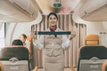 Air hostess Demonstration In-Flight Safety instrument instructions to Cabin crew on Preflight - PhotoDune Item for Sale