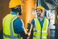 happy worker people join handshake team male working together friendship at industry workplace - PhotoDune Item for Sale