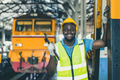 happy african black worker engineer male working heavy industry train locomotive service staff - PhotoDune Item for Sale