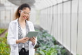 Happy Smiling Scientist Modern Farmer using Tablet Monitor Agriculture Farm Plant Research Working. - PhotoDune Item for Sale