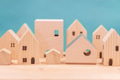 Village home wood figure for city concept. Small house wooden model for background - PhotoDune Item for Sale
