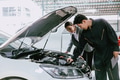 mechanic engineer working checking engine in garage auto shop car insurance claim cost estimate team - PhotoDune Item for Sale