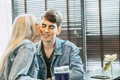 young couple lover kissing together, cheek kiss love expression at public space. - PhotoDune Item for Sale
