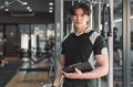 male muscle coach weight program trainer standing in gym sport club smart fitnees director - PhotoDune Item for Sale