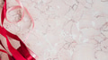Rolls of red ribbon on a pink marble background - PhotoDune Item for Sale
