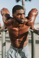Man doing push ups on bars - PhotoDune Item for Sale