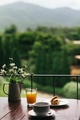 Breakfast on a wooden table with a natural view - PhotoDune Item for Sale