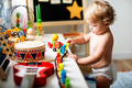 Baby in a diaper in a play room - PhotoDune Item for Sale
