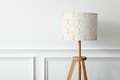 Floral patterned lamp on a white wall minimal interior design - PhotoDune Item for Sale