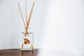 Aroma diffuser bottle on a wooden table - PhotoDune Item for Sale