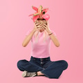 Asian woman holding potted aglaonema plant - PhotoDune Item for Sale