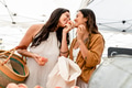 Lesbian couple grocery shopping at a local market - PhotoDune Item for Sale