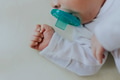 Peaceful baby sleeping in a crib - PhotoDune Item for Sale