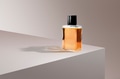 Perfume bottle on pink product backdrop - PhotoDune Item for Sale