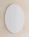 White oval sign on a wall mockup - PhotoDune Item for Sale