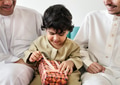 Muslim little boy with his family - PhotoDune Item for Sale
