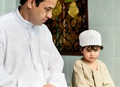 Muslim boy learning how to Salah - PhotoDune Item for Sale