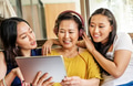 Asian family is using digital tablet together - PhotoDune Item for Sale
