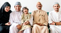 Muslim family relaxing in the home - PhotoDune Item for Sale