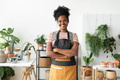 Happy small business owner at a plant shop - PhotoDune Item for Sale
