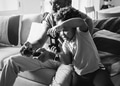Dad and son playing game at living room together - PhotoDune Item for Sale