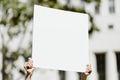Woman holding a white placard with copy space at the black lives matter protest - PhotoDune Item for Sale