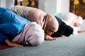 Muslim women praying in the mosque during Ramadan - PhotoDune Item for Sale