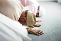 Muslim people praying in Sujud posture - PhotoDune Item for Sale