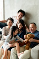 Happy extended Asian family spending time together - PhotoDune Item for Sale