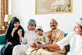 Muslim family having dried dates as a snack - PhotoDune Item for Sale