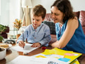 Mom Teaching Her Son Doing Homework - PhotoDune Item for Sale