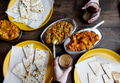 Aerial view of couple enjoying Rajasthani cuisine - PhotoDune Item for Sale
