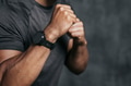 Athlete wearing a smartwatch in the gym - PhotoDune Item for Sale