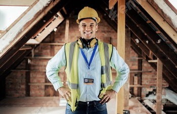 Construction, engineer and happy employee, smile and leadership on construction site or building re