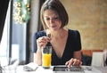 Girl in a bar with a tablet - PhotoDune Item for Sale