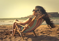 Girl sitting on a deckchair - PhotoDune Item for Sale