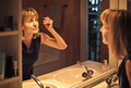 Woman applying make up - PhotoDune Item for Sale