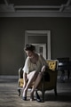 Woman sitting on an armchair - PhotoDune Item for Sale