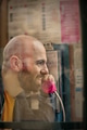 Man on a phone booth - PhotoDune Item for Sale