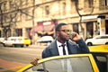 Man getting into a taxi - PhotoDune Item for Sale